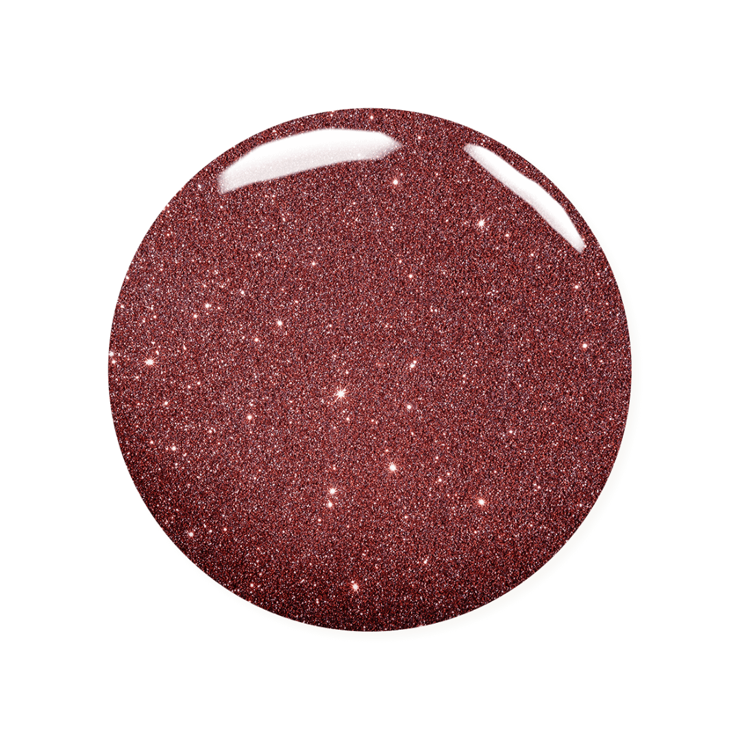 Red glittery nail polish on a white background