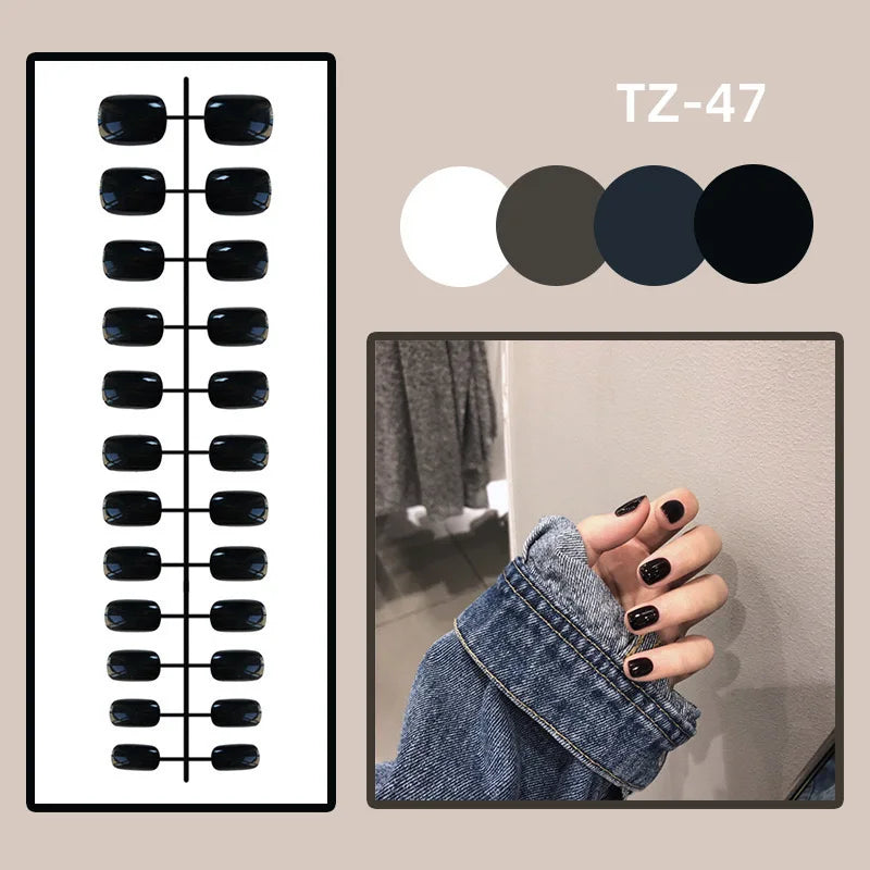 Nail color swatch chart with black nail polish, color palette, and a hand wearing denim sleeve.