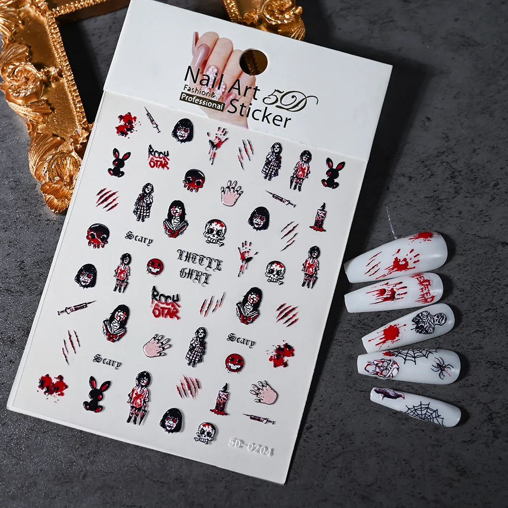 Nail art sticker sheet with Halloween-themed designs on a dark surface
