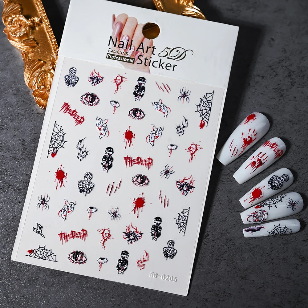 Nail art sticker sheet with Halloween-themed designs on a dark surface