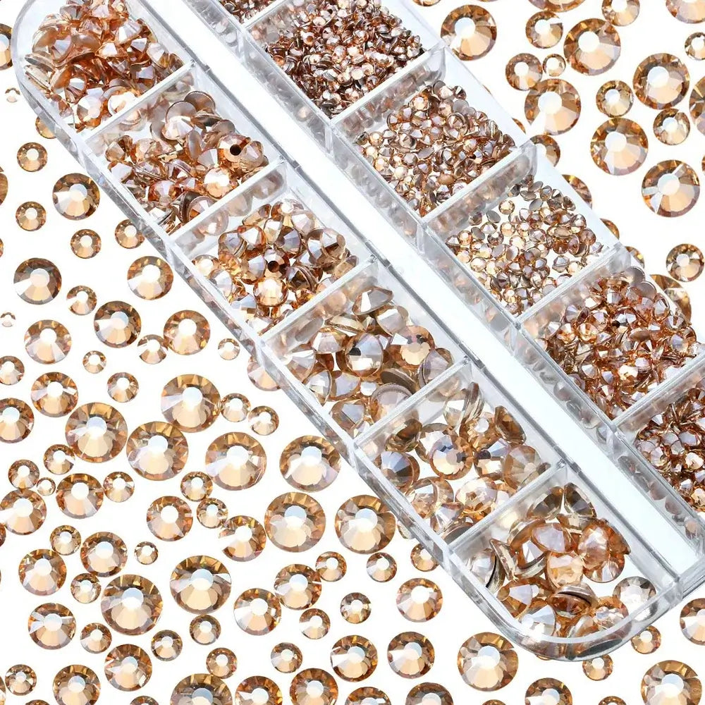 Clear container with gold rhinestones on a white background