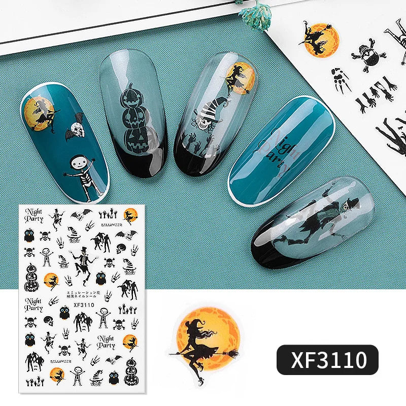 Nail art stickers with Halloween-themed designs on a blue mat, featuring a sheet of stickers and a product label.