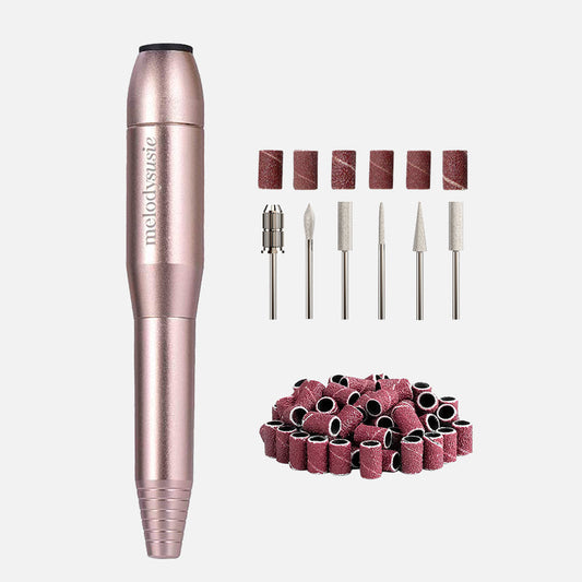 Rose gold nail drill with attachments on a white background