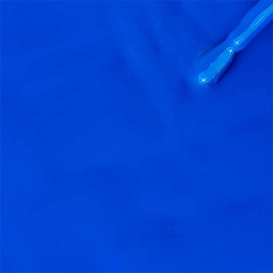 Blue gel with a applicator on a blue background