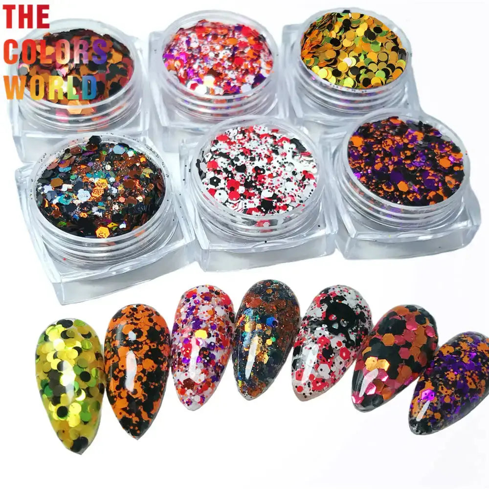 Set of nail art glitter in small containers with examples on nails.