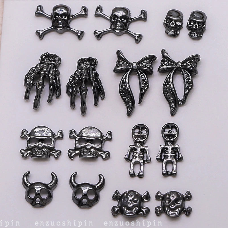 Collection of black skull and skeleton-themed nail art stickers on a white background.