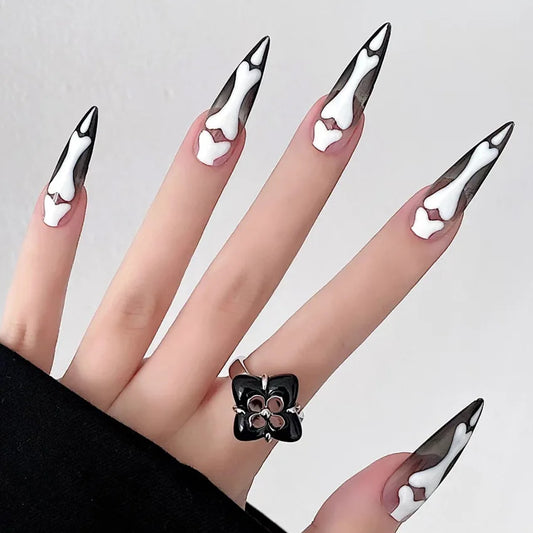 Stiletto skeleton fake Halloween nails for spooky and festive nail art
