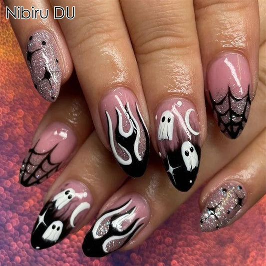 Nails with Halloween-themed designs on a textured background