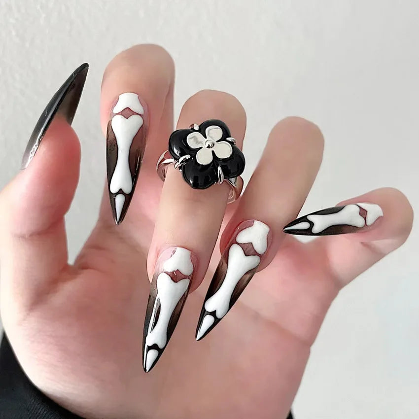 Stiletto skeleton fake Halloween nails for spooky and festive nail art