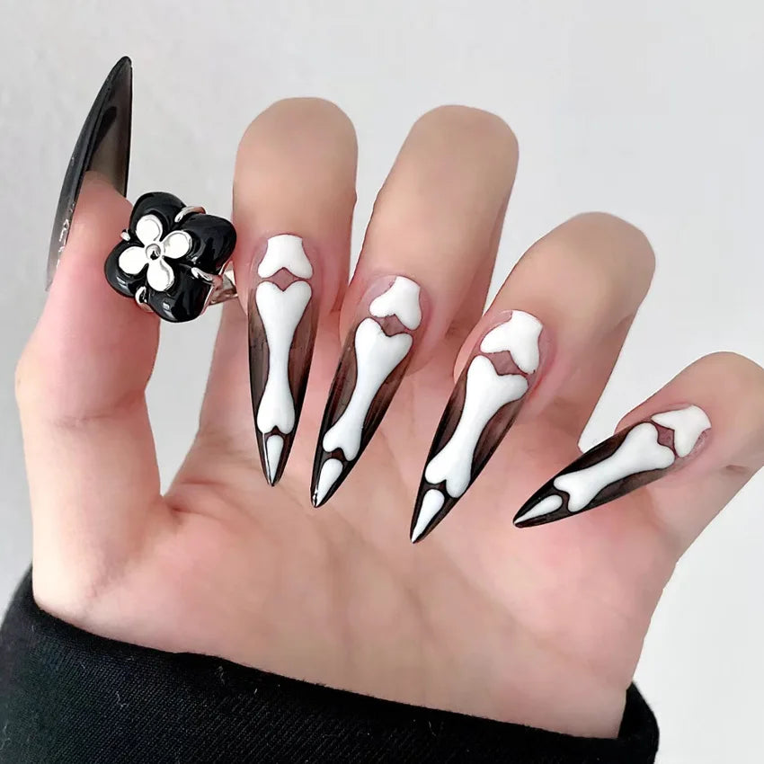 Stiletto skeleton fake Halloween nails for spooky and festive nail art