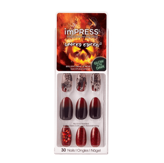 Packaged nail art with 'impress' branding and glow-in-the-dark feature on a white background